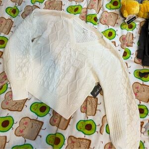 white cropped sweater